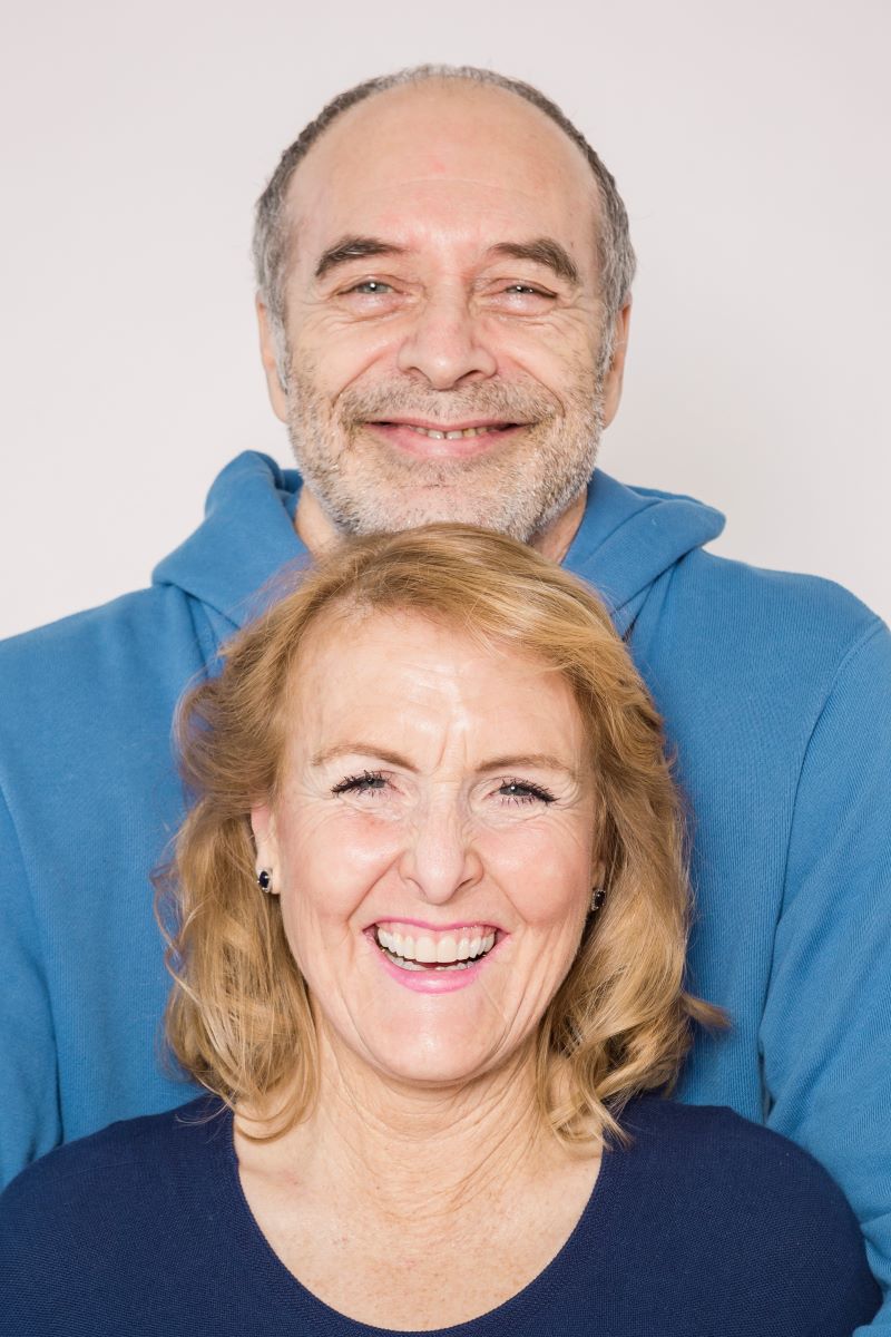 elderly couple smiling