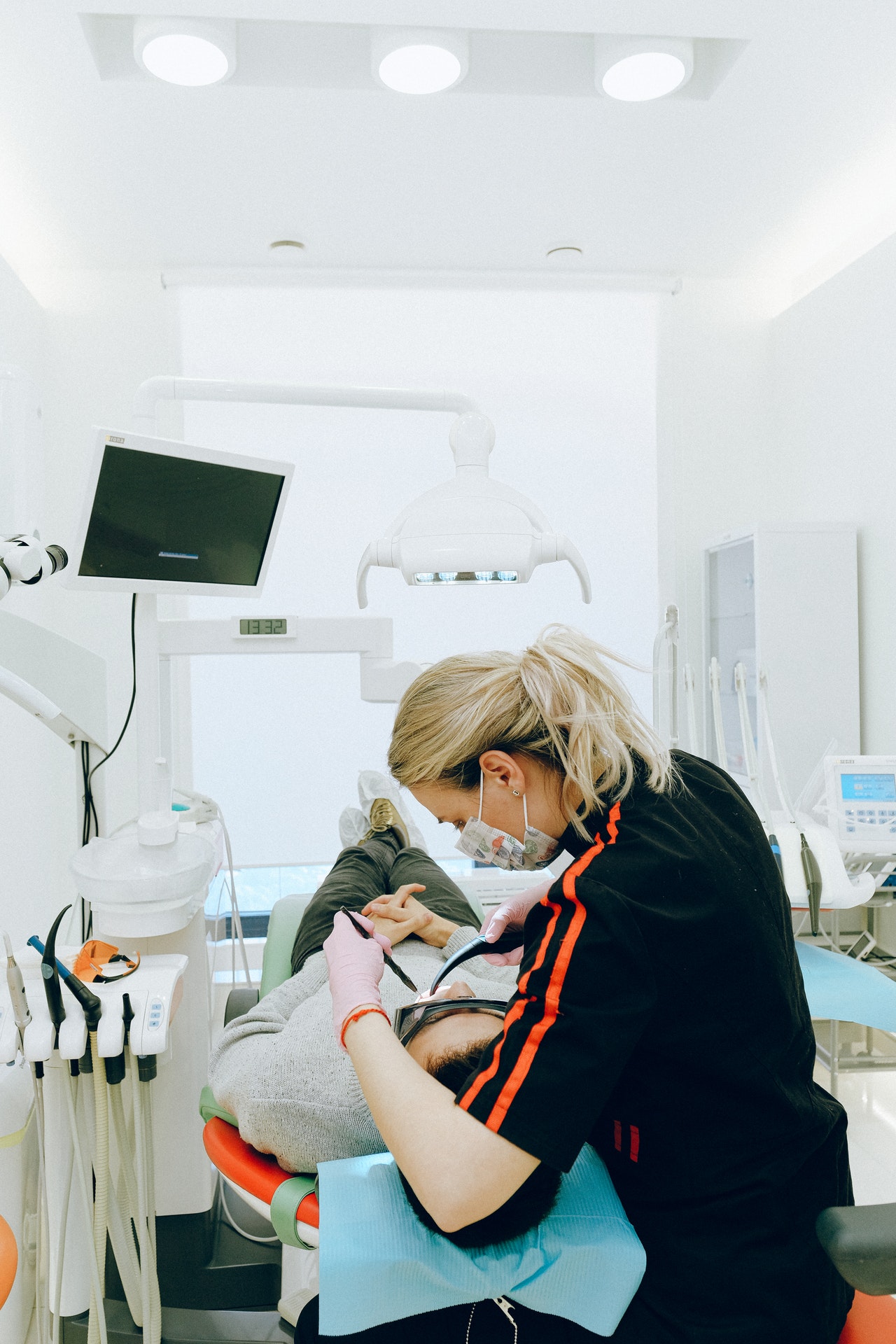 Dental professional preparing patient for dental crown procedure in Erie, PA