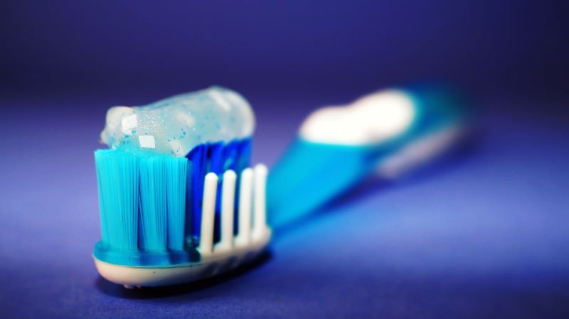 toothpaste gel on a toothbrush