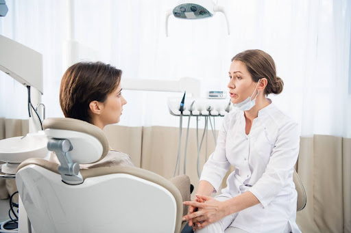 dentists speaks with patient in chair what is twilight anesthesia sleep dentistry erie